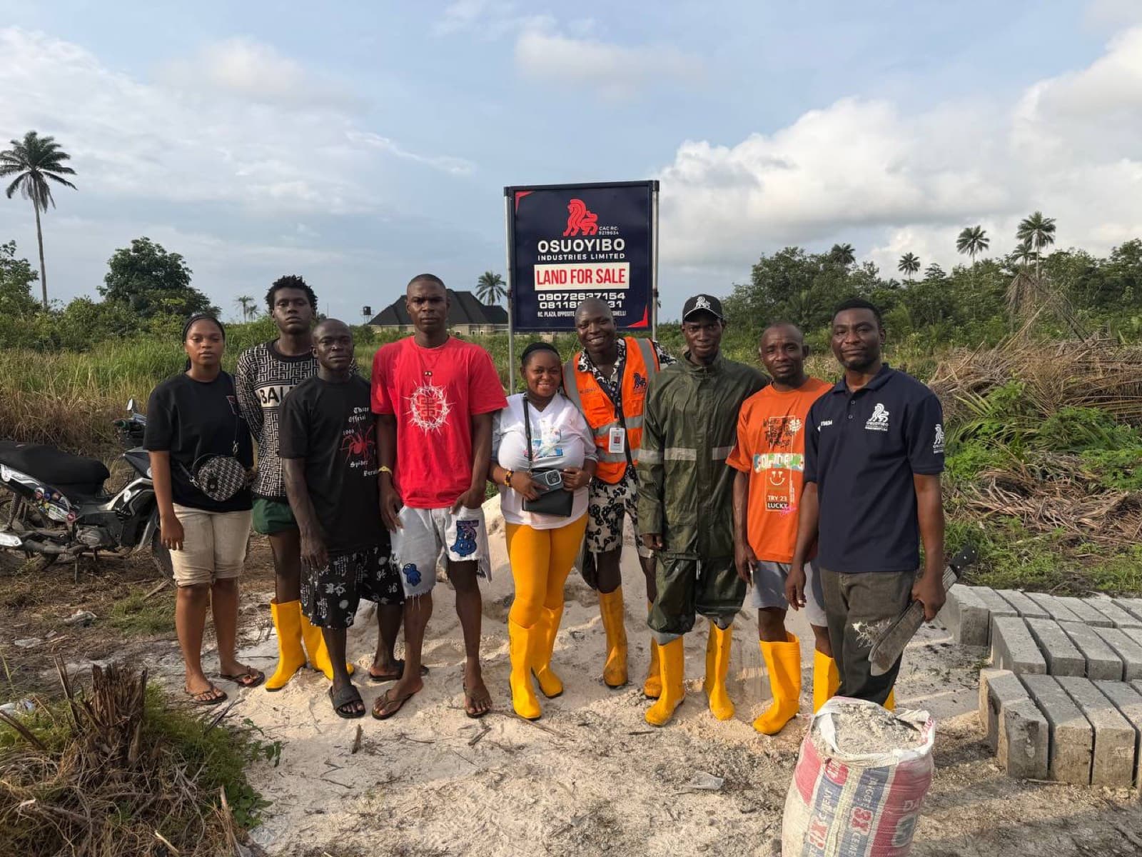 Osuoyibo advisors with clients inspecting land
